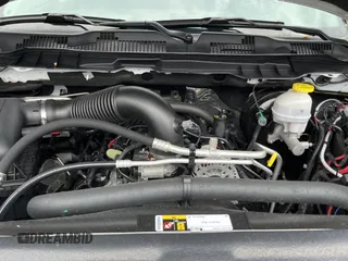 2023 Ram 1500 Tradesman with VIN 1C6RR7FT4PS588854, listed as a Copart auction lot 64556685 with 24,403 mi miles and Salvage title. Bid and sale history available at DreamBid. Image 7.