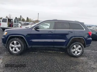 2012 Jeep Grand Cherokee Laredo with VIN 1C4RJFAG9CC220145, listed as a IAAI auction lot 41798457 with 130,603 mi miles. Bid and sale history available at carsss.com. Image 14.