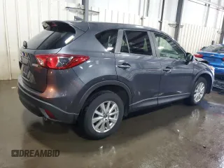 2016 Mazda CX-5 Touring z VIN JM3KE4CY5G0852073, wystawiony jako Copart lot #56599055 z przebiegiem 72 167 mil mil oraz Szkoda całkowita • Salvage title. Historia ofert i sprzedaży dostępna na DreamBid. Obrazek 3.