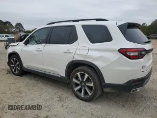 2024 Honda Pilot Touring z VIN 5FNYG2H74RB011187, wystawiony jako Copart lot #79999324 z przebiegiem 16 123 mil mil oraz Szkoda całkowita • Salvage title. Historia ofert i sprzedaży dostępna na DreamBid. Obrazek 2.