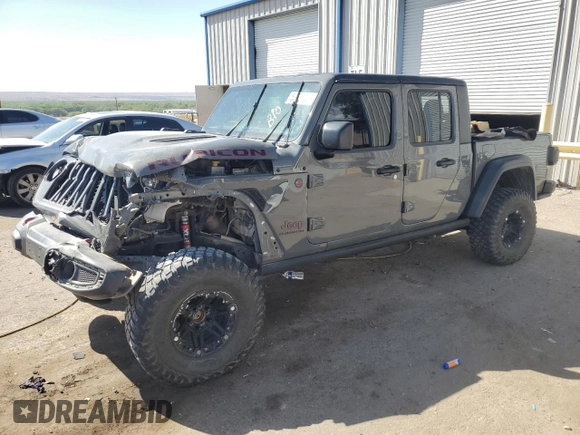 2020 Jeep Gladiator Rubicon with VIN 1C6JJTBG9LL163270, listed as a Copart auction lot 53654005 with 74,744 mi miles and Salvage title. Bid and sale history available at DreamBid. Image 1.
