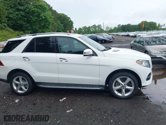 2018 Mercedes-Benz GLE 350 with VIN 4JGDA5HB7JB157348, listed as a IAAI auction lot 42467198 with 72,784 mi miles and . Bid and sale history available at DreamBid. Image 13.