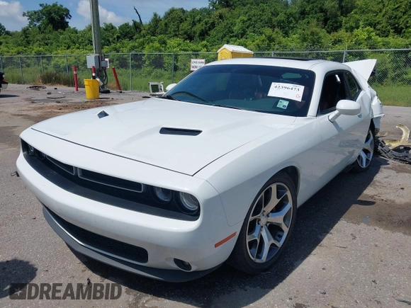 2015 Dodge Challenger SXT Plus with VIN 2C3CDZBG4FH905009, listed as a IAAI auction lot 42396473 with 197,459 mi miles and . Bid and sale history available at DreamBid. Image 2.