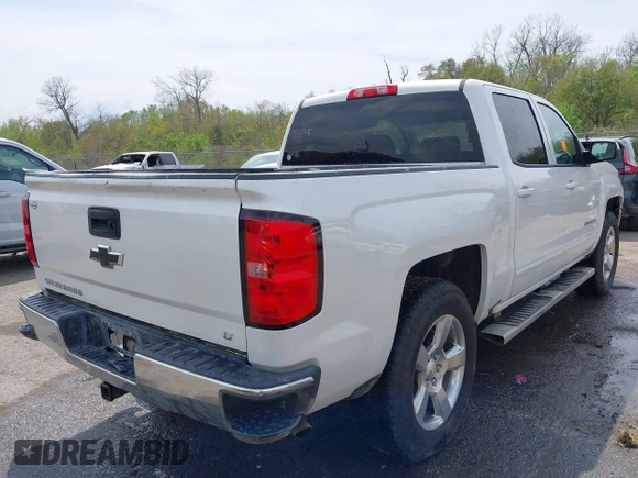 2017 Chevrolet Silverado 1500 LT with VIN 3GCPCREC6HG271083, listed as a IAAI auction lot 41875428 with Not Provided miles and . Bid and sale history available at DreamBid. Image 4.