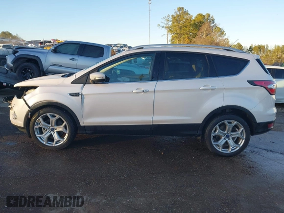 2017 Ford Escape Titanium with VIN 1FMCU0J98HUA75690, listed as a IAAI auction lot 41358534 with 90,376 mi miles. Bid and sale history available at carsss.com. Image 15.