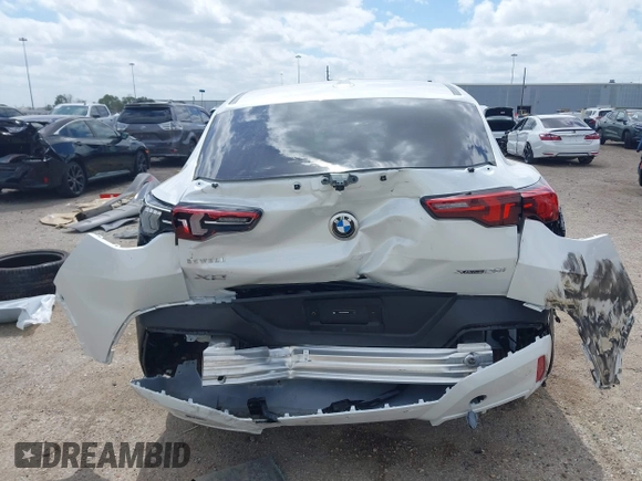 2025 BMW X2 xDrive28i with VIN WBX63GM06S5066386, listed as a IAAI auction lot 41812615 with 1,598 mi miles. Bid and sale history available at carsss.com. Image 16.