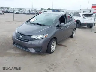 2015 Honda Fit LX with VIN 3HGGK5H56FM713871, listed as a IAAI auction lot 41861828 with 206,588 mi miles. Bid and sale history available at carsss.com. Image 2.
