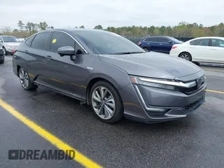 2018 Honda Clarity Plug-In Hybrid Touring with VIN JHMZC5F31JC019474, listed as a IAAI auction lot 41864595 with 154,415 mi miles. Bid and sale history available at carsss.com. Image 1.