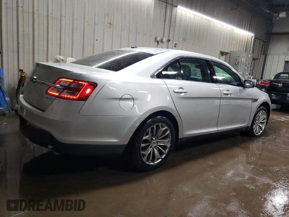 2015 Ford Taurus Limited with VIN 1FAHP2F87FG118723, listed as a Copart auction lot 85486104 with 156,853 mi miles and Salvage Title. Bid and sale history available at DreamBid. Image 3.