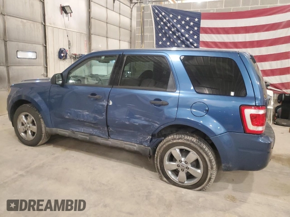 2009 Ford Escape XLS with VIN 1FMCU02769KC80094, listed as a Copart auction lot 50651005 with 205,247 mi miles and Salvage title. Bid and sale history available at DreamBid. Image 2.