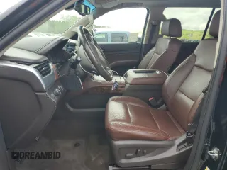 2015 Chevrolet Suburban LTZ with VIN 1GNSKKKC4FR119803, listed as a Copart auction lot 51416775 with 135,366 mi miles and Salvage Title. Bid and sale history available at DreamBid. Image 7.