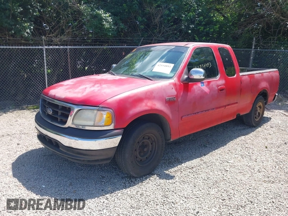 2002 Ford F-150 XL z VIN 1FTRX17212KB77969, wystawiony jako IAAI lot #42554893 z przebiegiem Nie podano mil oraz . Historia ofert i sprzedaży dostępna na DreamBid. Obrazek 19.