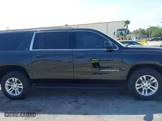 2018 Chevrolet Suburban LT with VIN 1GNSCHKC7JR111560, listed as a IAAI auction lot 41823175 with 136,751 mi miles. Bid and sale history available at carsss.com. Image 13.