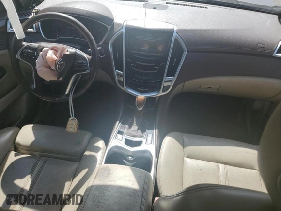 2015 Cadillac SRX Performance Collection z VIN 3GYFNCE30FS533686, wystawiony jako Copart lot #49820745 z przebiegiem 134 363 mil mil oraz Szkoda całkowita • Salvage title. Historia ofert i sprzedaży dostępna na DreamBid. Obrazek 8.
