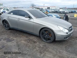 2006 Mercedes-Benz CLS-Class with VIN WDDDJ75X96A016977, listed as a IAAI auction lot 41732930 with 128,683 mi miles. Bid and sale history available at carsss.com. Image 1.
