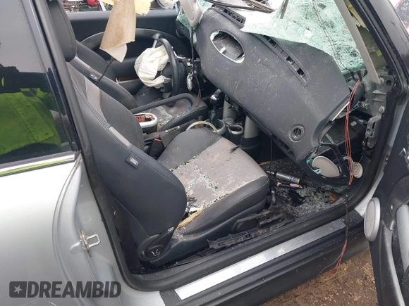 2006 MINI Hardtop S with VIN WMWRE33546TL23876, listed as a IAAI auction lot 41858060 with 146,359 mi miles and . Bid and sale history available at DreamBid. Image 5.