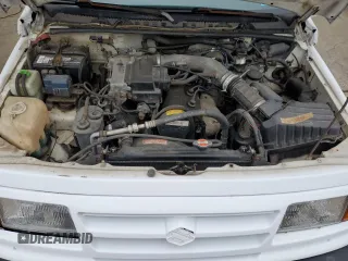 1996 Suzuki Sidekick JX z VIN 2S3TD03V7T6409487, wystawiony jako Copart lot #49977795 z przebiegiem 137 011 mil mil oraz Szkoda całkowita • Salvage title. Historia ofert i sprzedaży dostępna na DreamBid. Obrazek 12.