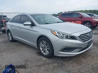2016 Hyundai Sonata SE z VIN 5NPE24AF1GH320614, wystawiony jako IAAI lot #37626315 z przebiegiem 122 441 mil mil oraz . Historia ofert i sprzedaży dostępna na DreamBid. Obrazek 1.