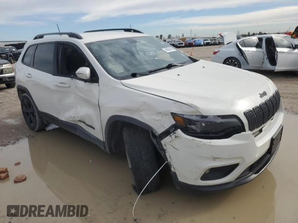 2019 Jeep Cherokee Latitude Plus with VIN 1C4PJLLB7KD338758, listed as a Copart auction lot 46354245 with 106,328 mi miles and Salvage Title. Bid and sale history available at carsss.com. Image 4.