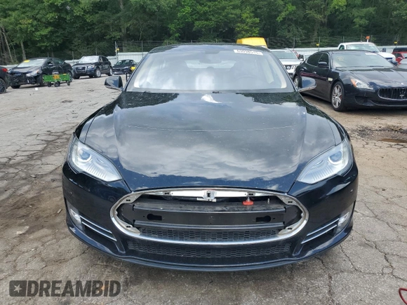 2013 Tesla Model S with VIN 5YJSA1CN8DFP06126, listed as a Copart auction lot 63098515 with 47,215 mi miles and Clean title. Bid and sale history available at DreamBid. Image 5.