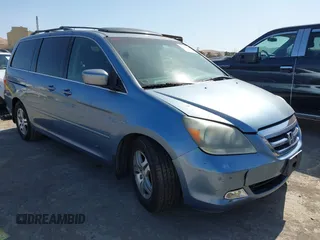 2005 Honda Odyssey Touring z VIN 5FNRL38895B073936, wystawiony jako IAAI lot #42498257 z przebiegiem 148 757 mil mil oraz . Historia ofert i sprzedaży dostępna na DreamBid. Obrazek 1.