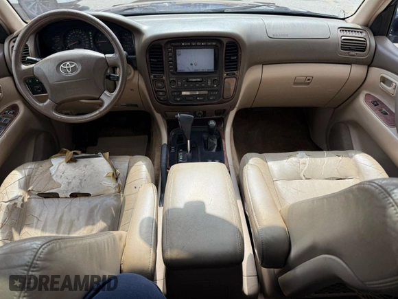 2002 Toyota Land Cruiser z VIN JTEHT05J622022972, wystawiony jako Copart lot #59201475 z przebiegiem 299 548 mil mil oraz Czysty tytuł • Clean title. Historia ofert i sprzedaży dostępna na DreamBid. Obrazek 9.