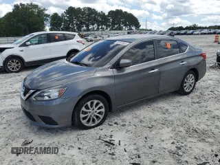 2018 Nissan Sentra SV z VIN 3N1AB7AP7JL610780, wystawiony jako Copart lot #61081565 z przebiegiem 66 810 mil mil oraz Czysty tytuł • Clean title. Historia ofert i sprzedaży dostępna na DreamBid. Obrazek 1.