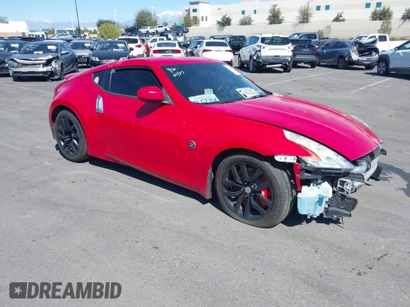 2014 Nissan 370Z Nismo with VIN JN1AZ4EH9EM636306, listed as a IAAI auction lot 41467766 with 101,021 mi miles and . Bid and sale history available at DreamBid. Image 1.