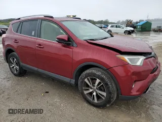 2018 Toyota RAV4 XLE with VIN JTMWFREV0JD130324, listed as a Copart auction lot 41790875 with 236,109 mi miles and Salvage title. Bid and sale history available at DreamBid. Image 4.