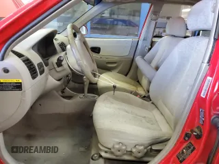 2004 Hyundai Accent GL with VIN KMHCG45C94U538368, listed as a Copart auction lot 42444565 with 163,028 mi miles and Salvage Title. Bid and sale history available at carsss.com. Image 7.