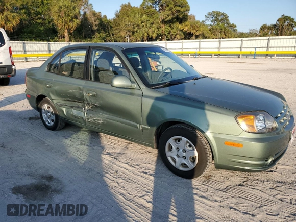 2005 Hyundai Accent GLS with VIN KMHCG45C35U595666, listed as a Copart auction lot 88294365 with 70,497 mi miles and Salvage Title. Bid and sale history available at carsss.com. Image 4.