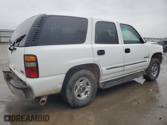2004 GMC Yukon SLE with VIN 1GKEK13V64J228294, listed as a Copart auction lot 86573574 with 150,780 mi miles and Salvage Title. Bid and sale history available at carsss.com. Image 3.