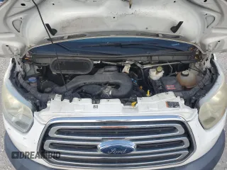 2015 Ford Transit Cargo with VIN 1FTNR1ZM8FKA33669, listed as a Copart auction lot 63588345 with 86,260 mi miles and Salvage title. Bid and sale history available at DreamBid. Image 12.