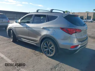2018 Hyundai Santa Fe Ultimate z VIN 5XYZW4LA1JG515019, wystawiony jako IAAI lot #42248389 z przebiegiem 60 222 mil mil oraz . Historia ofert i sprzedaży dostępna na DreamBid. Obrazek 3.