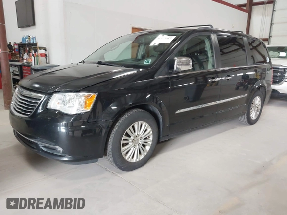 2013 Chrysler Town & Country Limited with VIN 2C4RC1GG0DR509167, listed as a IAAI auction lot 41973819 with 186,896 mi miles. Bid and sale history available at carsss.com. Image 2.