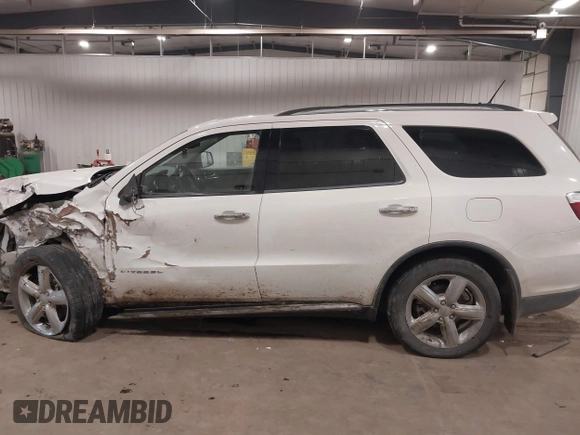 2011 Dodge Durango Citadel with VIN 1D4RE5GG3BC731017, listed as a IAAI auction lot 41406363 with 202,960 mi miles. Bid and sale history available at carsss.com. Image 14.