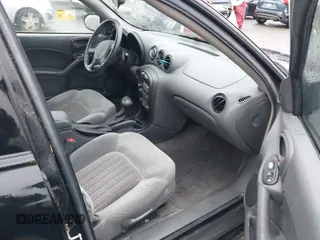 2004 Pontiac Grand Am GT with VIN 1G2NW52E64M677552, listed as a IAAI auction lot 41101595 with 100,644 mi miles. Bid and sale history available at carsss.com. Image 5.