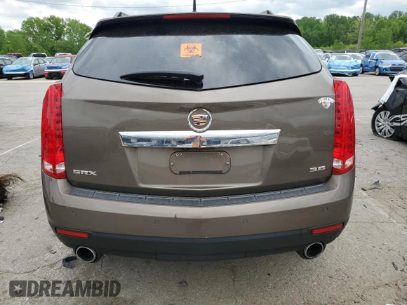 2014 Cadillac SRX Luxury Collection z VIN 3GYFNBE3XES626319, wystawiony jako Copart lot #54776405 z przebiegiem 107 734 mil mil oraz Szkoda całkowita • Salvage title. Historia ofert i sprzedaży dostępna na DreamBid. Obrazek 6.