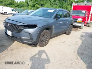 2024 Mazda CX-50 S Premium z VIN 7MMVABDM7RN231991, wystawiony jako IAAI lot #42481427 z przebiegiem 7 843 mil mil oraz . Historia ofert i sprzedaży dostępna na DreamBid. Obrazek 22.