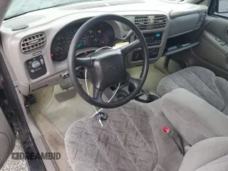 1999 GMC Sonoma SLS with VIN 1GTCS19X1X8503254, listed as a Copart auction lot 77546124 with 121,345 mi miles and Clean Title. Bid and sale history available at carsss.com. Image 8.
