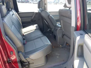 2006 Nissan Titan LE with VIN 1N6BA07A56N527691, listed as a IAAI auction lot 41820340 with 250,551 mi miles and . Bid and sale history available at DreamBid. Image 8.