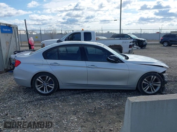 2015 BMW 3 Series 328i with VIN WBA3A5C55FF609490, listed as a IAAI auction lot 42006008 with 110,239 mi miles. Bid and sale history available at carsss.com. Image 13.