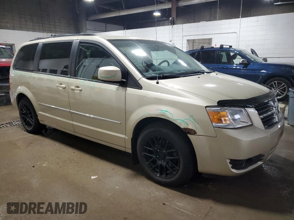 2010 Dodge Grand Caravan Crew with VIN 2D4RN6DX7AR463122, listed as a Copart auction lot 48768635 with 102,497 mi miles and Salvage Title. Bid and sale history available at DreamBid. Image 4.