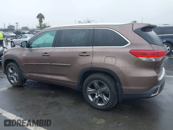 2018 Toyota Highlander Hybrid Limited with VIN 5TDDGRFH2JS039556, listed as a IAAI auction lot 41539754 with 71,924 mi miles and . Bid and sale history available at DreamBid. Image 3.