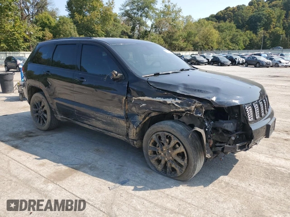 2018 Jeep Grand Cherokee Laredo E with VIN 1C4RJFAG9JC390597, listed as a Copart auction lot 71450474 with 69,645 mi miles and Salvage title. Bid and sale history available at DreamBid. Image 4.