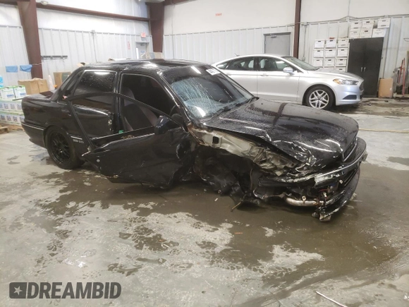 1988 Mitsubishi Galant with VIN E39A0010917, listed as a Copart auction lot 44421775 with 14,813 mi miles and Salvage Title. Bid and sale history available at DreamBid. Image 4.
