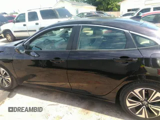 2016 Honda Civic EX-L z VIN 19XFC1F74GE041373, wystawiony jako IAAI lot #42201565 z przebiegiem 122 069 mil mil oraz . Historia ofert i sprzedaży dostępna na DreamBid. Obrazek 14.