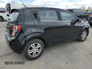 2012 Chevrolet Sonic LT with VIN 1G1JC6SB7C4200604, listed as a Copart auction lot 52843945 with 101,039 mi miles and Salvage Title. Bid and sale history available at carsss.com. Image 3.