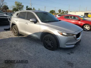 2020 Mazda CX-5 Touring with VIN JM3KFACM8L0764878, listed as a Copart auction lot 49303865 with 114,890 mi miles and Salvage Title. Bid and sale history available at carsss.com. Image 4.