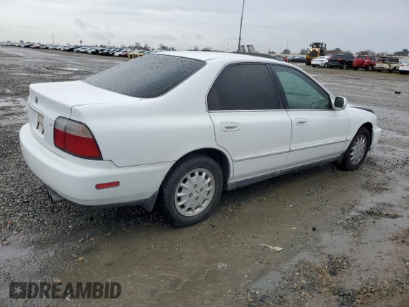 1997 Honda Accord EX with VIN 1HGCD565XVA178602, listed as a Copart auction lot 84797774 with 250,955 mi miles and Salvage Title. Bid and sale history available at DreamBid. Image 3.